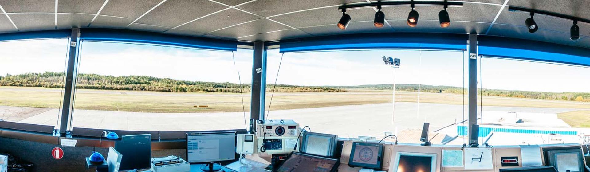 Inside of an air traffic control tower showing all the technical instrumentation.